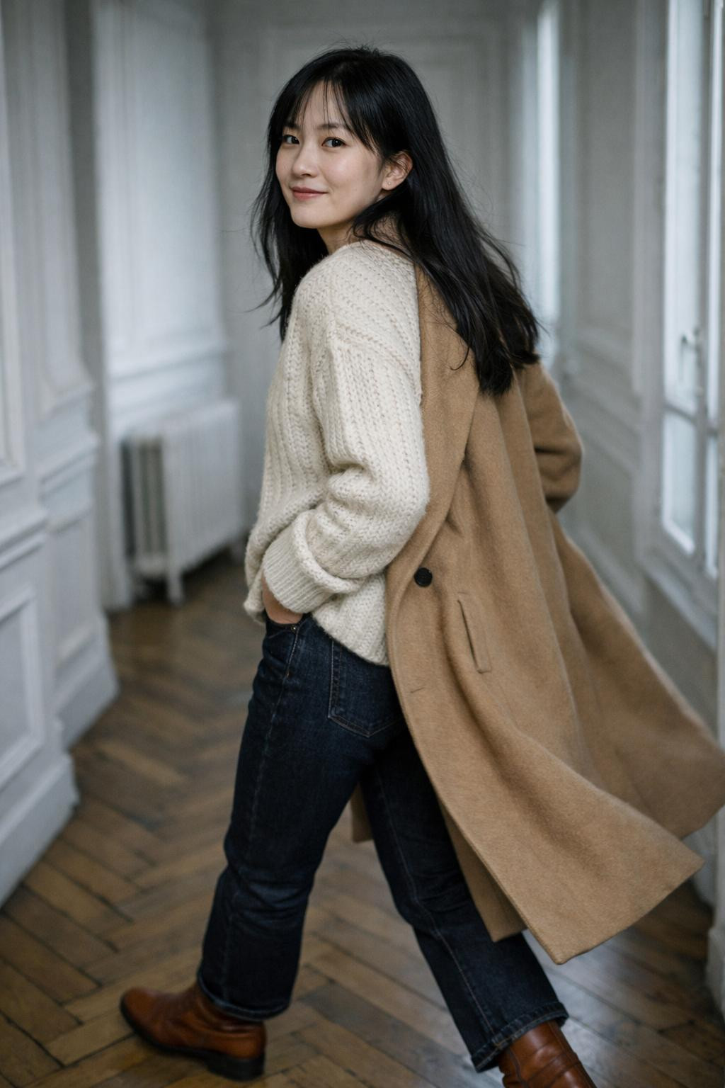 Casual winter outfits with chunky cream cable-knit sweater and camel wool coat