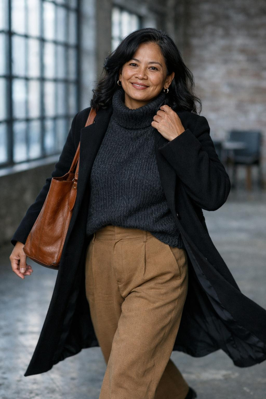 Cute winter outfits with charcoal turtleneck and camel wide-leg trousers
