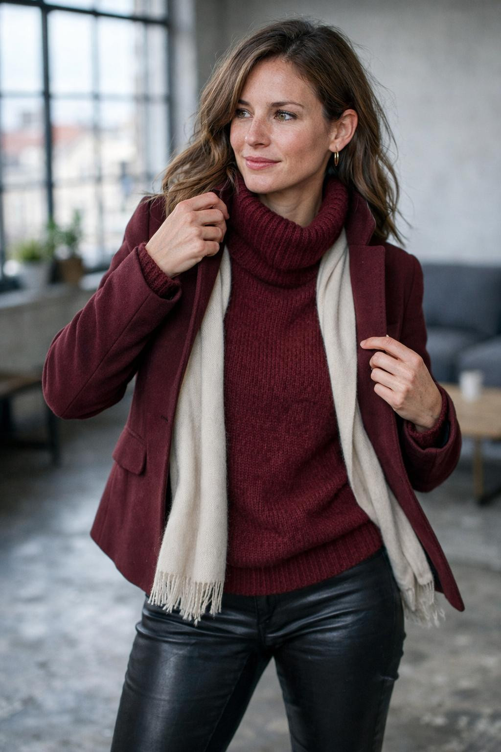 Winter birthday outfit with burgundy turtleneck and black leather skinny pants