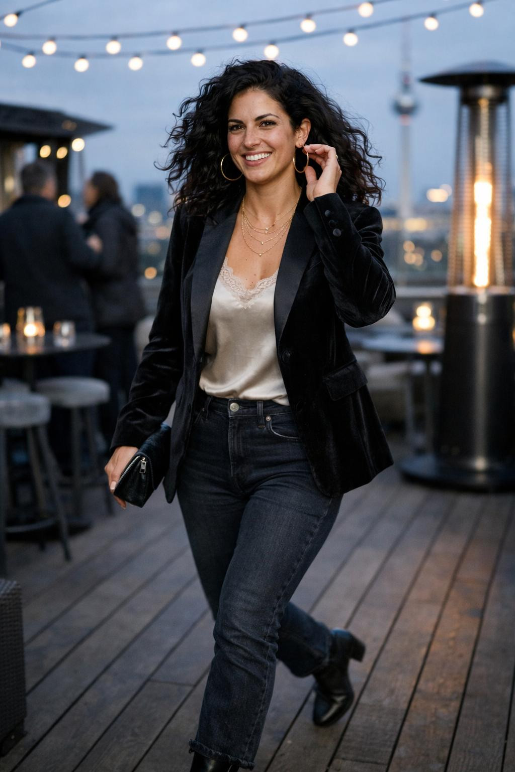 Winter birthday outfit with black velvet blazer and champagne silk top