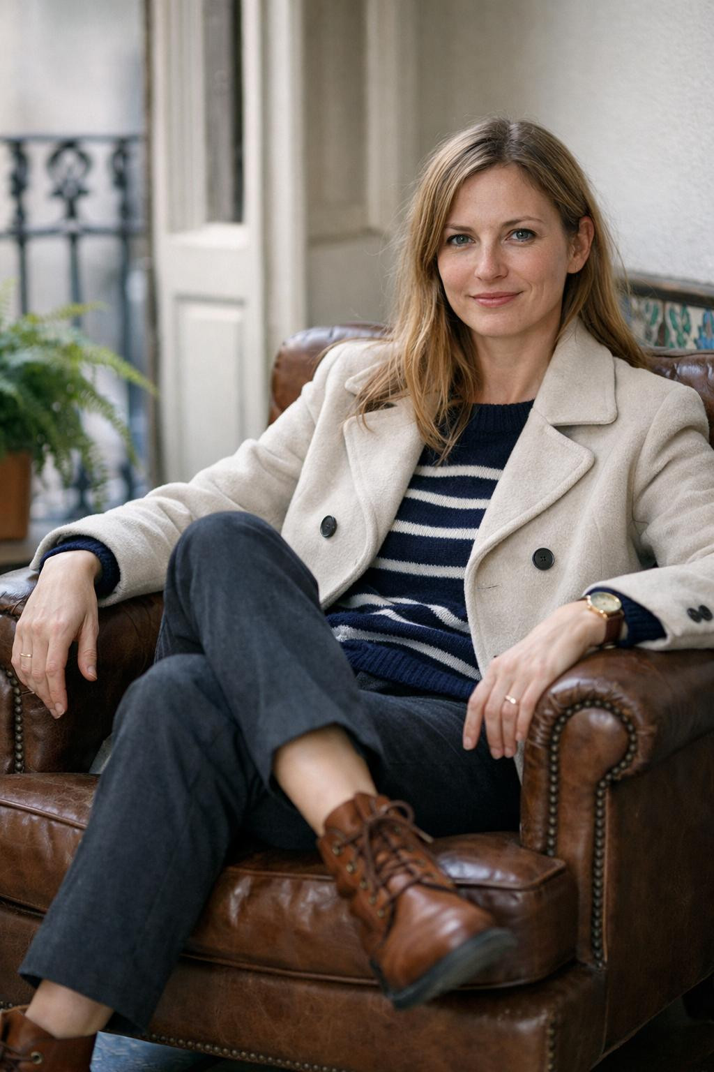 Winter shoes featuring cognac leather ankle boots with navy outfit