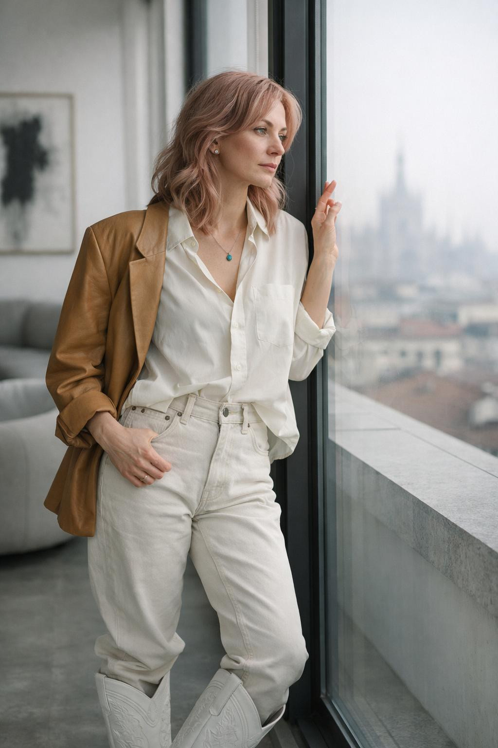 White cowboy boots outfit with silk shirt and vintage jeans