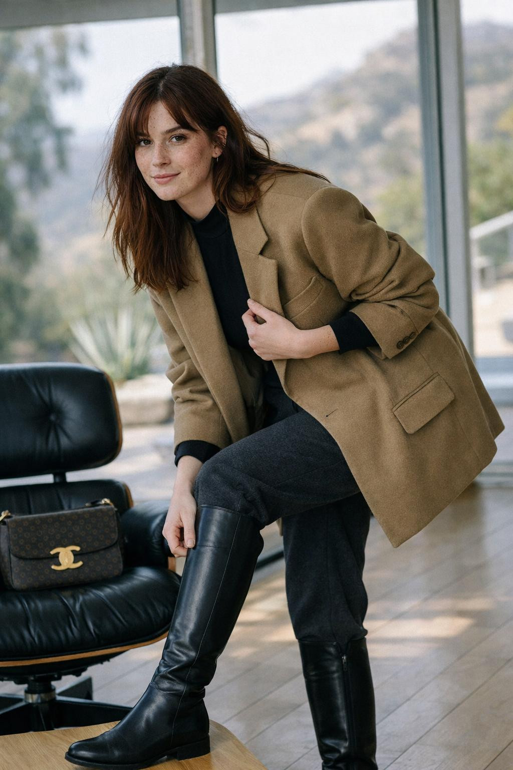 Knee high boots outfit with black boots and camel blazer coat