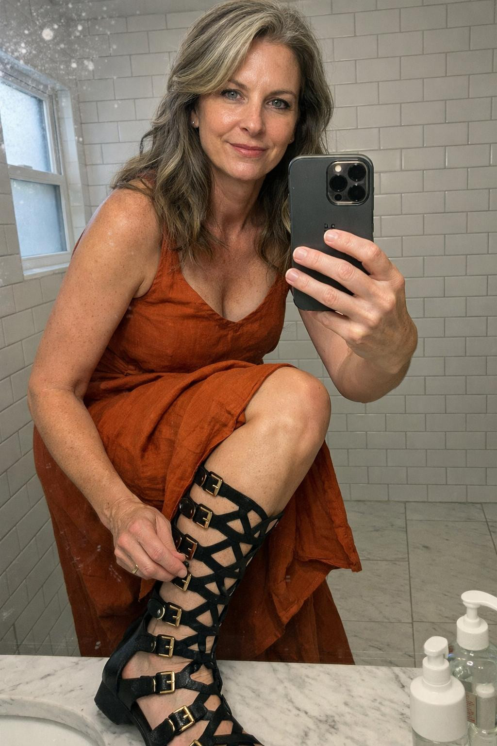 Gladiator sandals with geometric cutouts and gold hardware