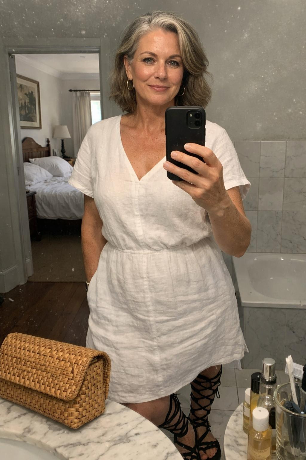 Gladiator sandals styled with textured white linen dress
