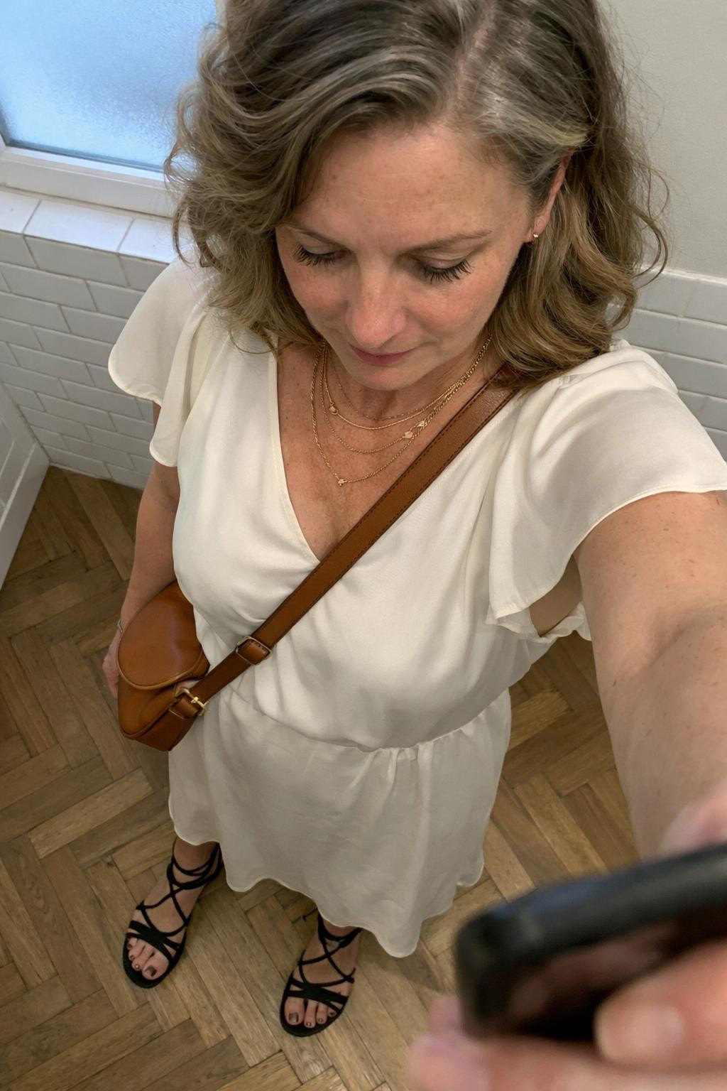 Gladiator sandals outfit with ivory silk dress
