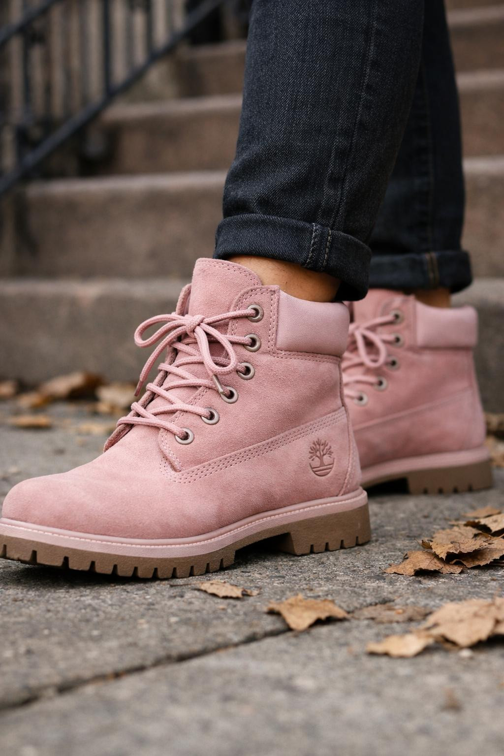 Pink Timberland boots outfit close-up with black skinny jeans