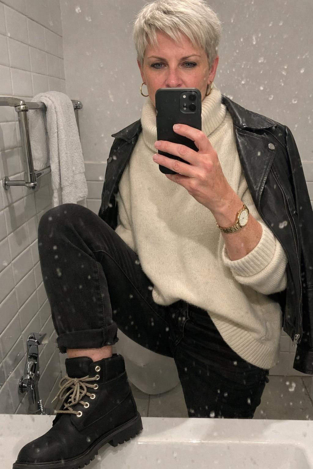 Black Timberland boots outfit with cream turtleneck and leather jacket