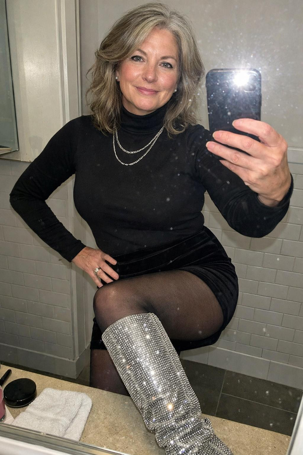 Sparkly boots outfit with rhinestone knee-high boots and velvet skirt