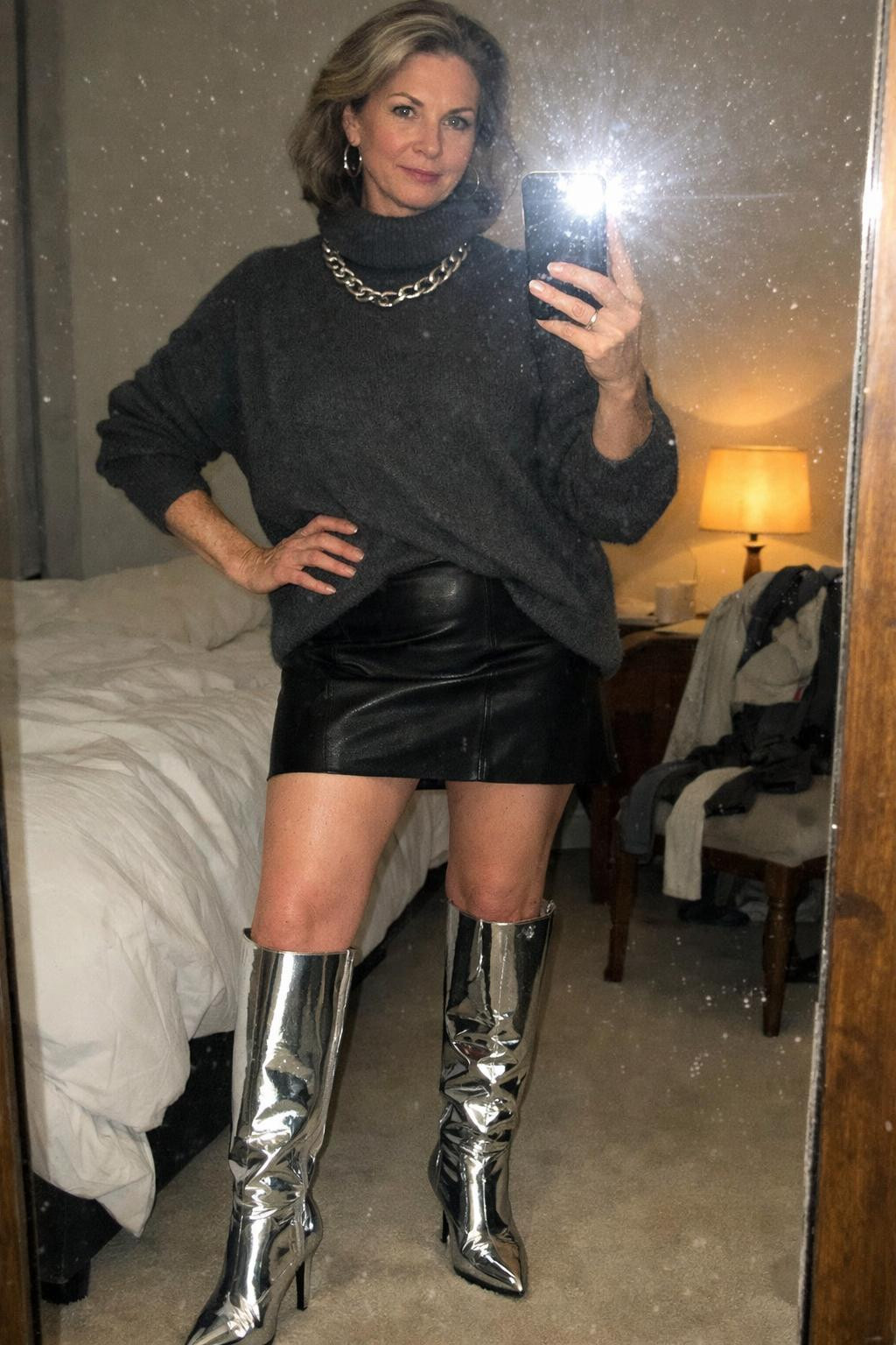 Sparkly boots outfit with ultra-shiny silver knee-high boots and turtleneck