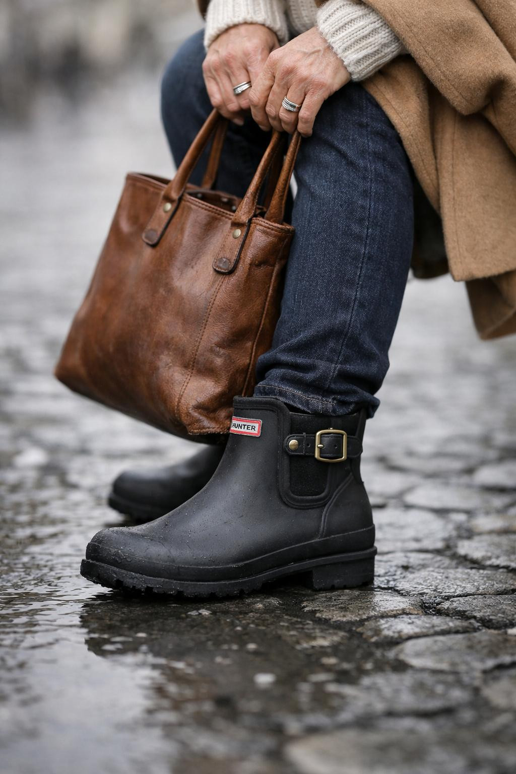 Short hunter boots outfit close-up with motion blur