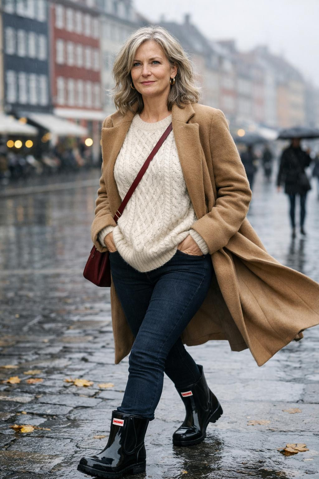 Short hunter boots outfit capturing movement in camel coat