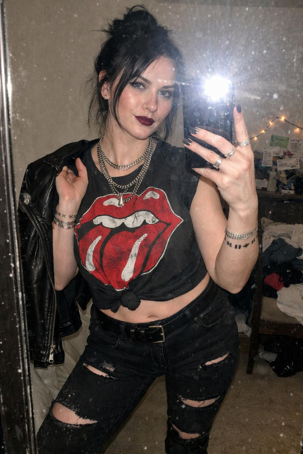 Concert outfit ideas with vintage tee and moto