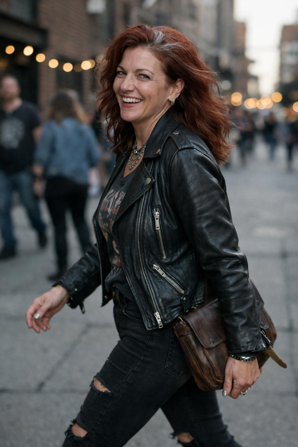 Concert outfit ideas with leather moto at sunset