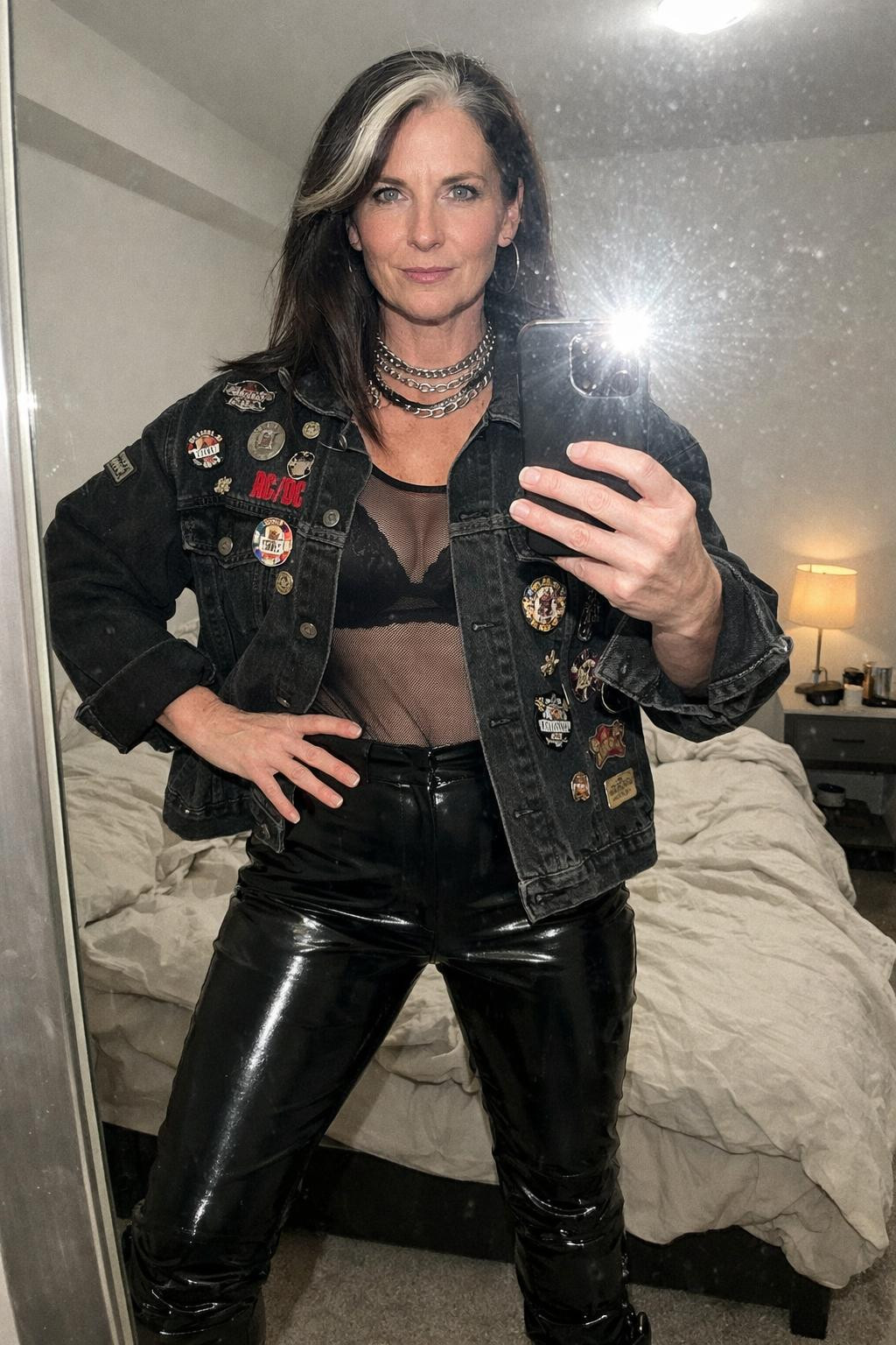 Rock concert outfit with enamel pins on denim jacket