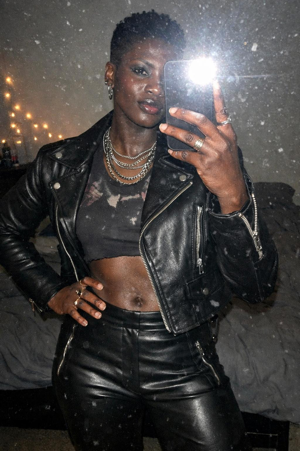Concert outfit black women featuring platform combat boots and leather jacket