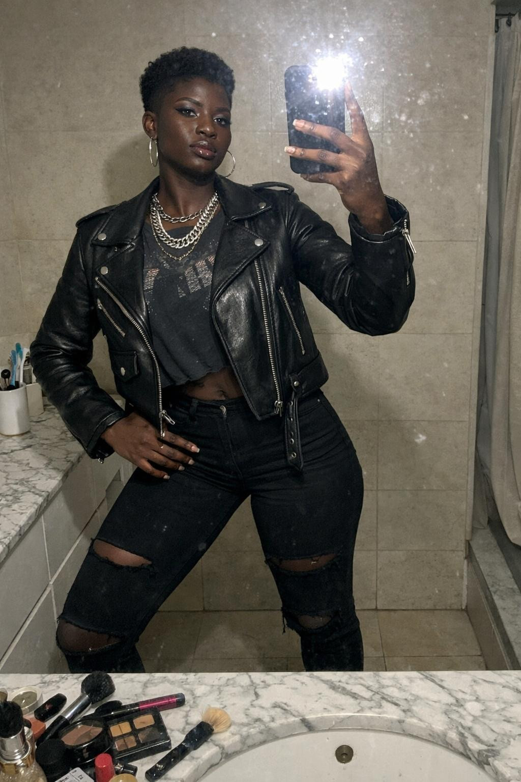 Concert outfit black women with combat boots and edgy accessories