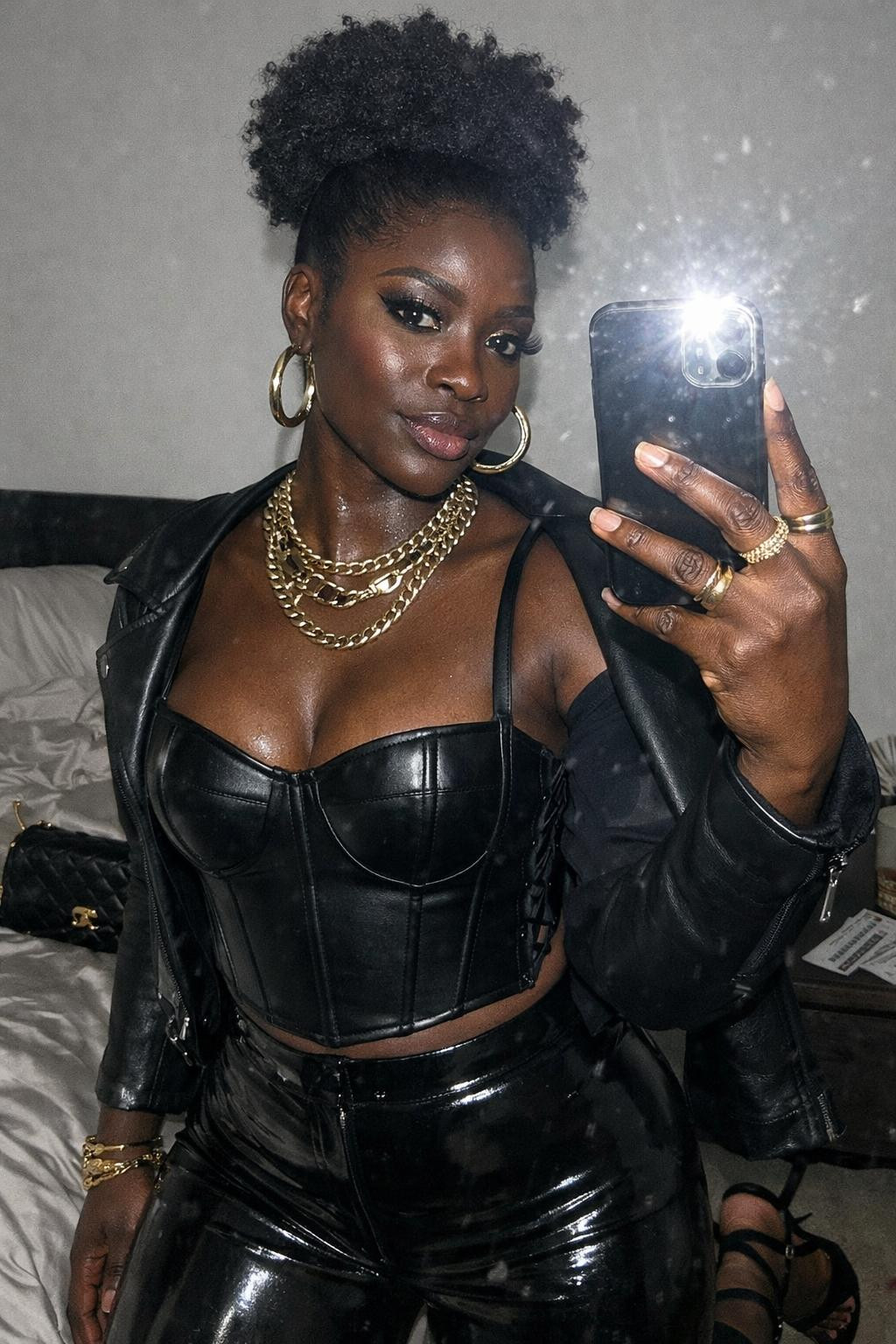 Concert outfit black women with vinyl pants and leather corset top