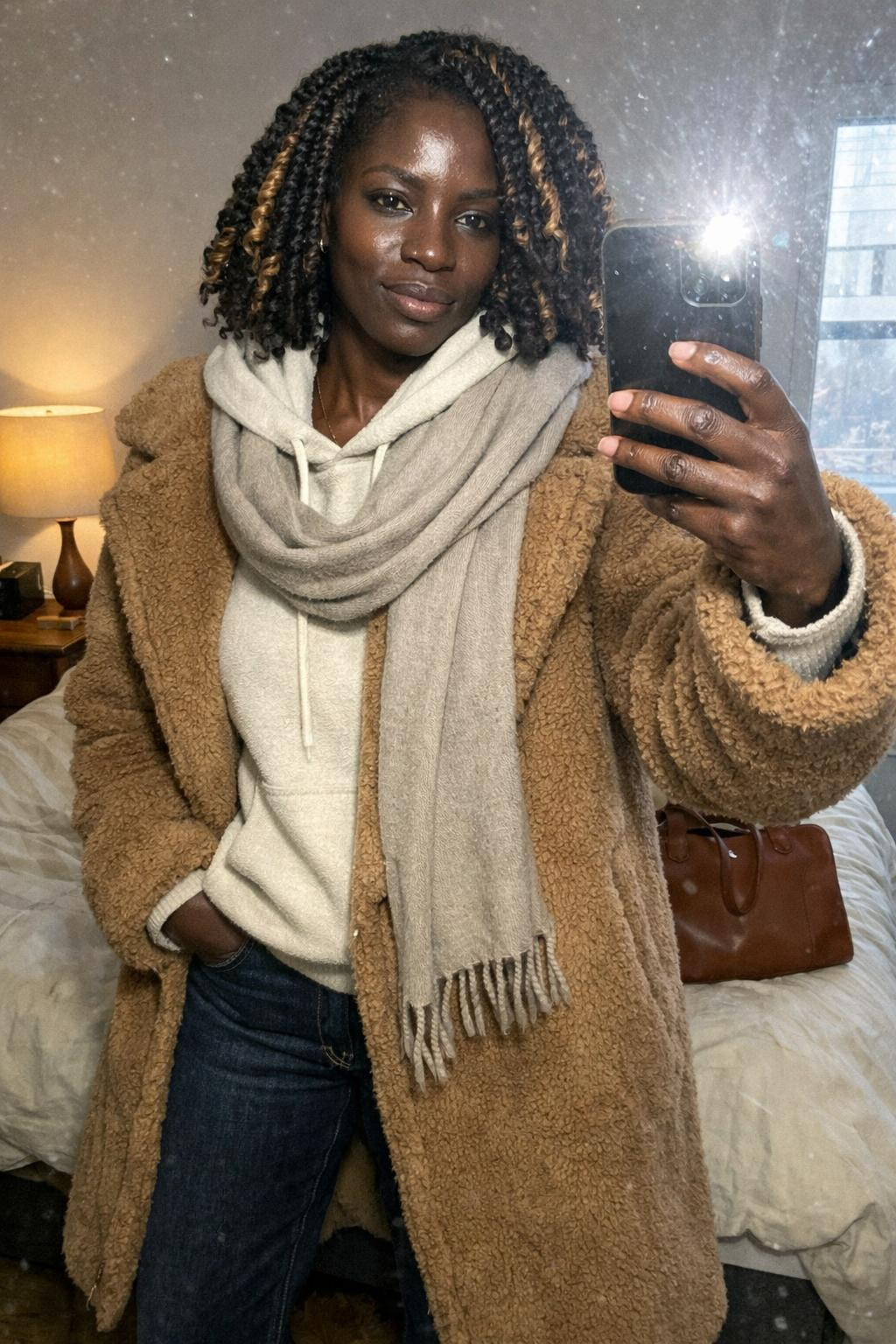Winter concert outfit on Black woman with natural coils and teddy coat
