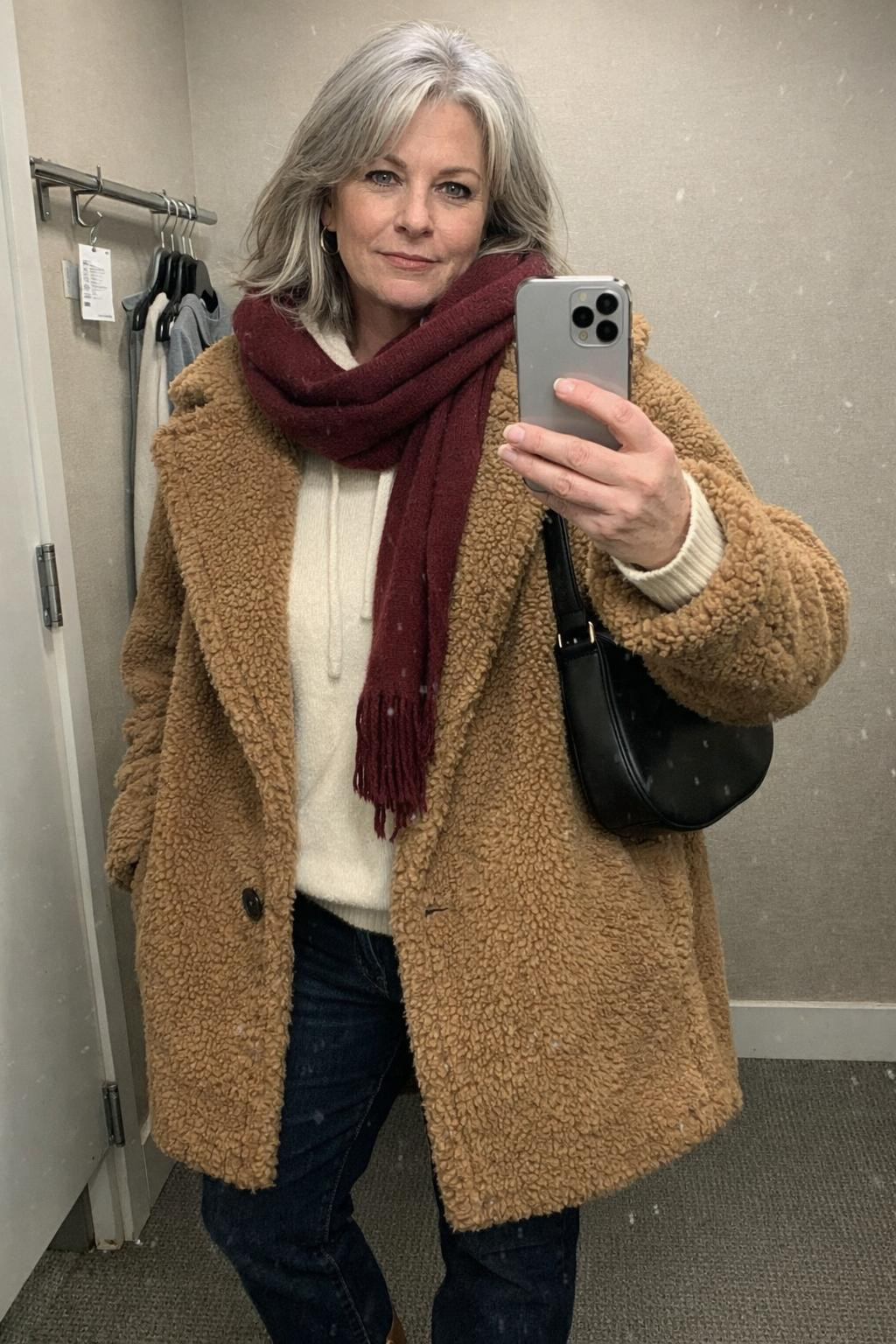 Winter concert outfit ideas with burgundy scarf and neutral coat