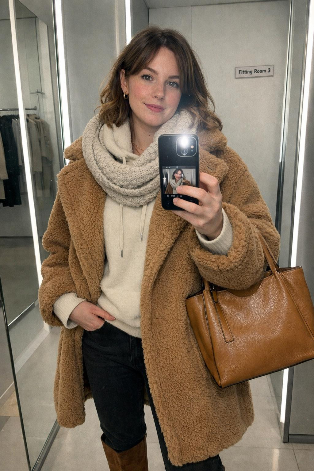 Winter concert outfit with gold jewelry and neutral layers