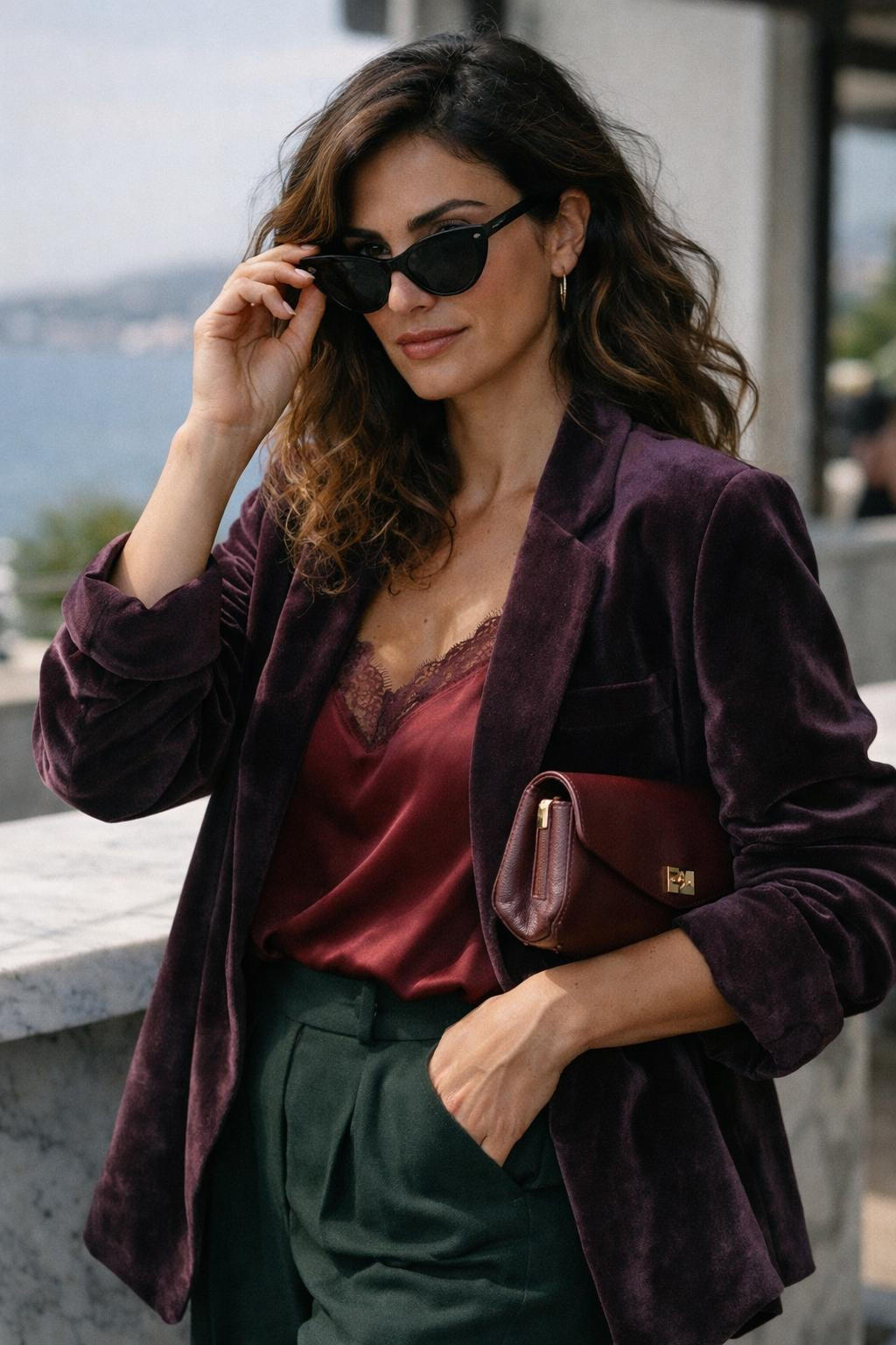 Holiday party outfit with oversized plum velvet and wide-leg trousers