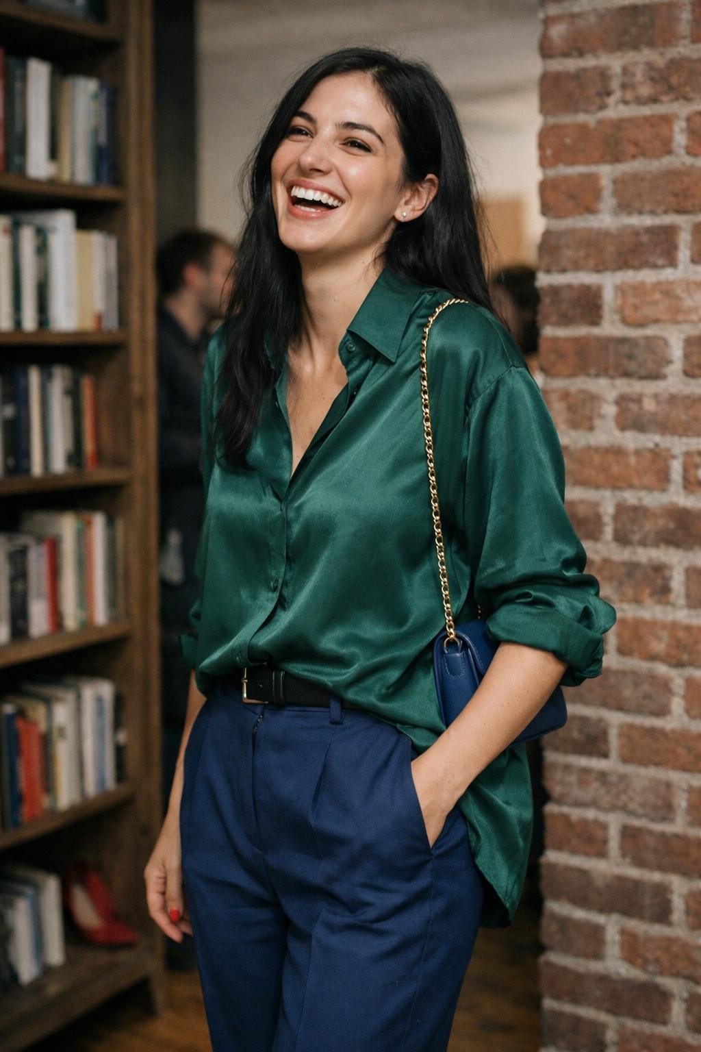 House party outfit with oversized emerald silk boyfriend shirt and sapphire tailored trousers