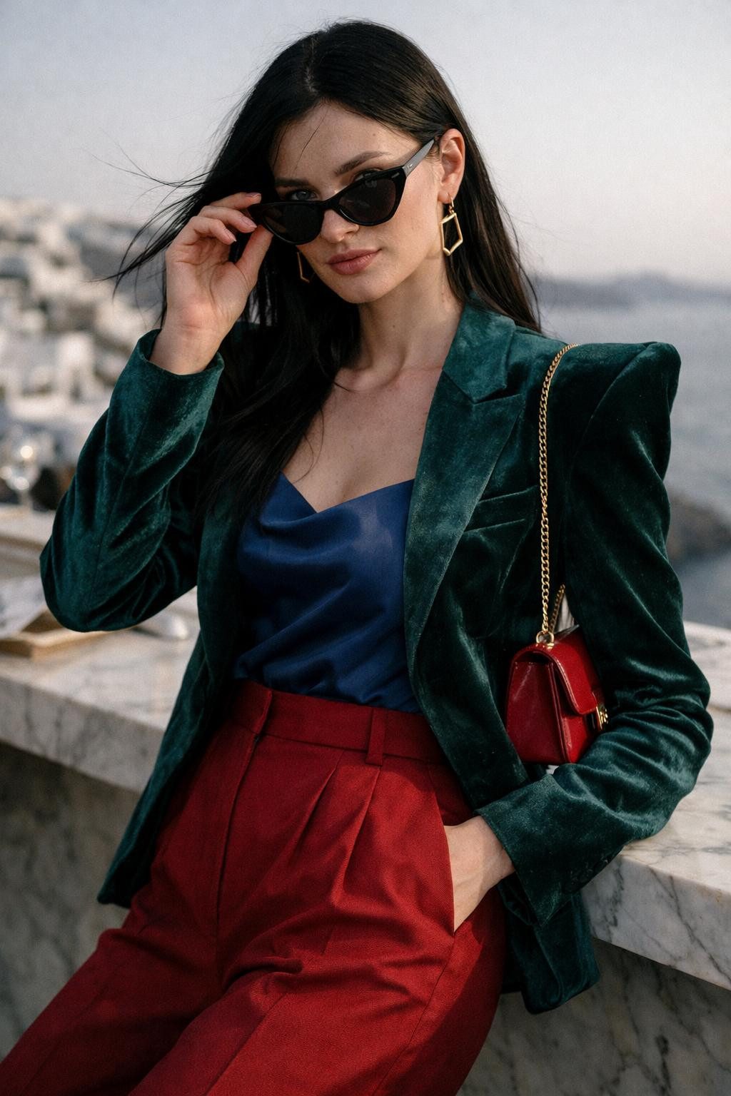 Winter party outfit with architectural emerald blazer and sharp shoulders