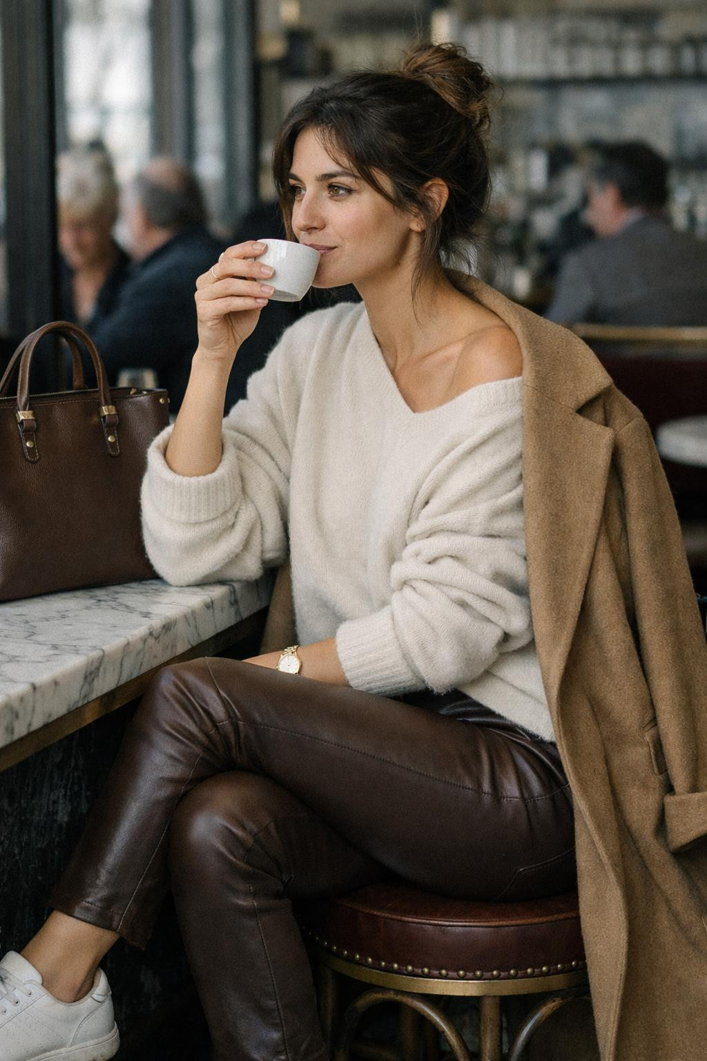 Legging outfits with chocolate brown leather leggings and oversized sweater