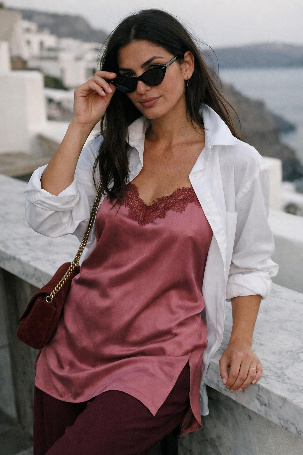 Valentine's Day outfits mixing rose silk slip with crisp white shirt layers