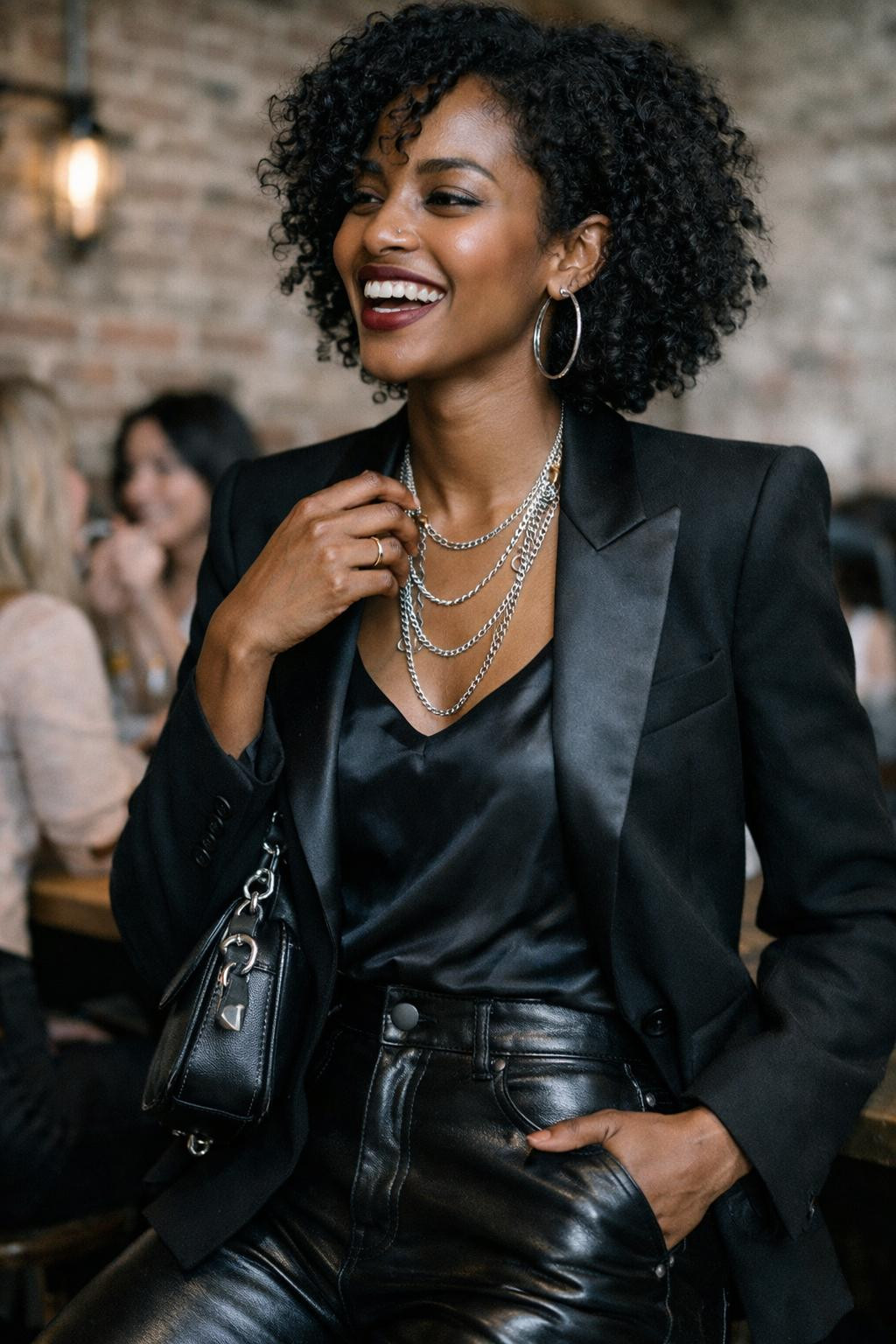 Galentine's Day outfit with black leather pants and tailored blazer