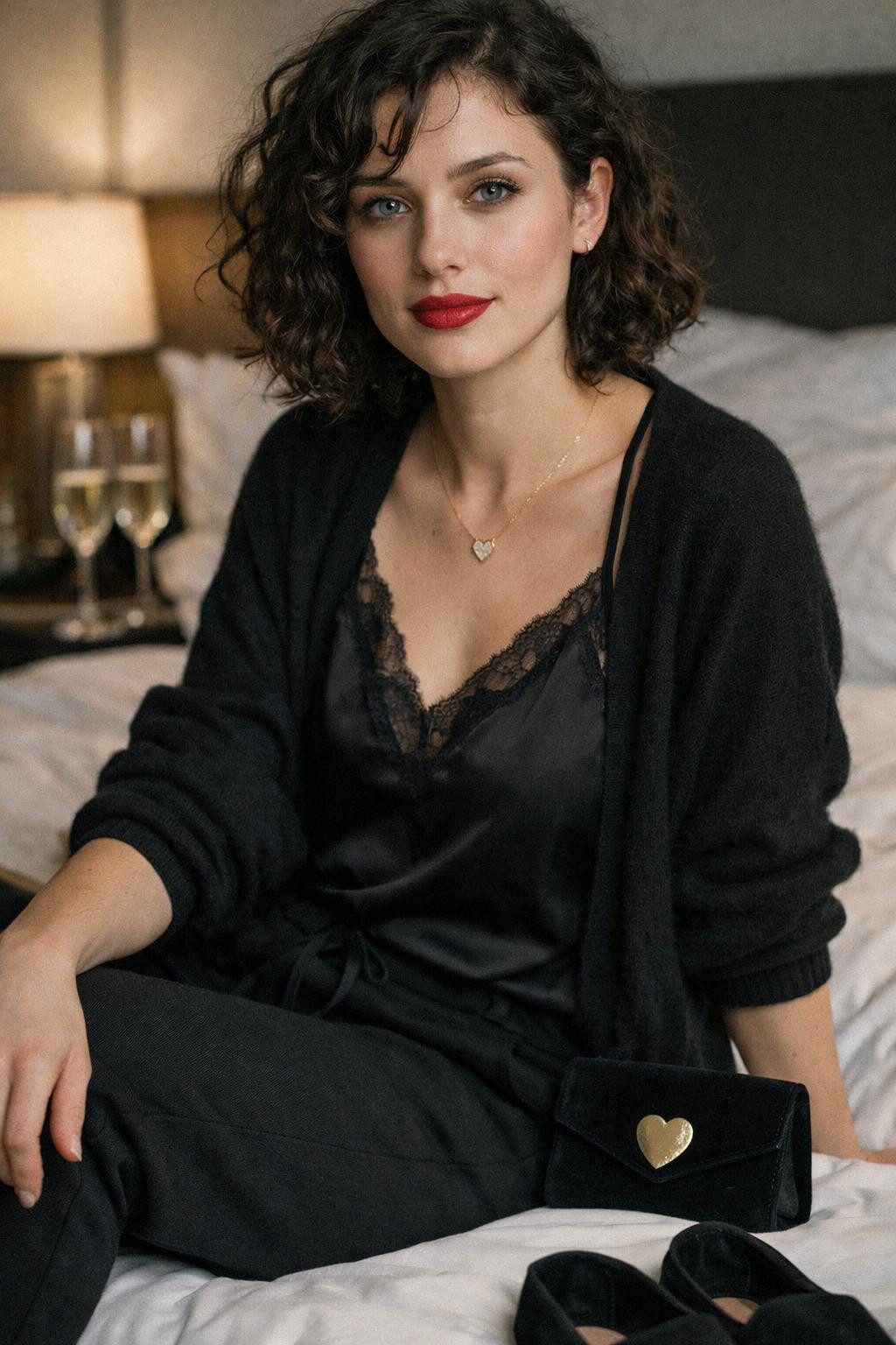 Black Valentine's outfit featuring silk camisole with cashmere cardigan