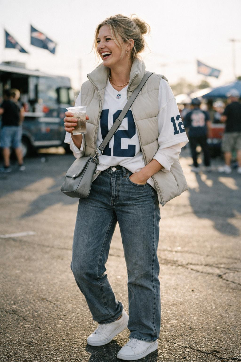 Super Bowl outfit ideas with white jersey and beige architectural puffer vest