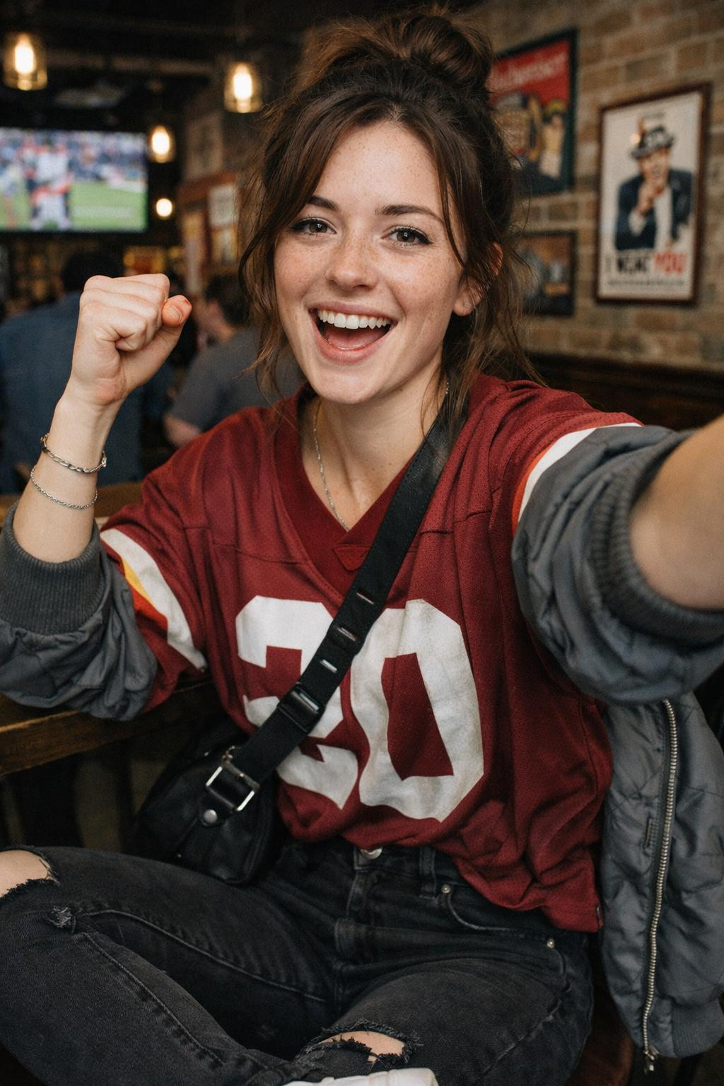 Super Bowl outfit with vintage burgundy jersey and grey bomber jacket
