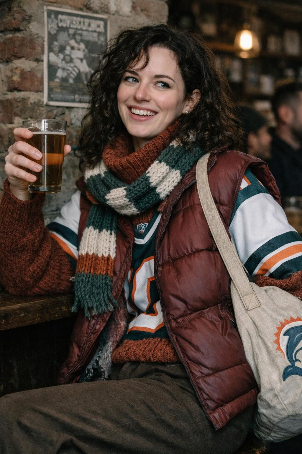 Super Bowl outfit with burgundy puffer vest and layered knitwear