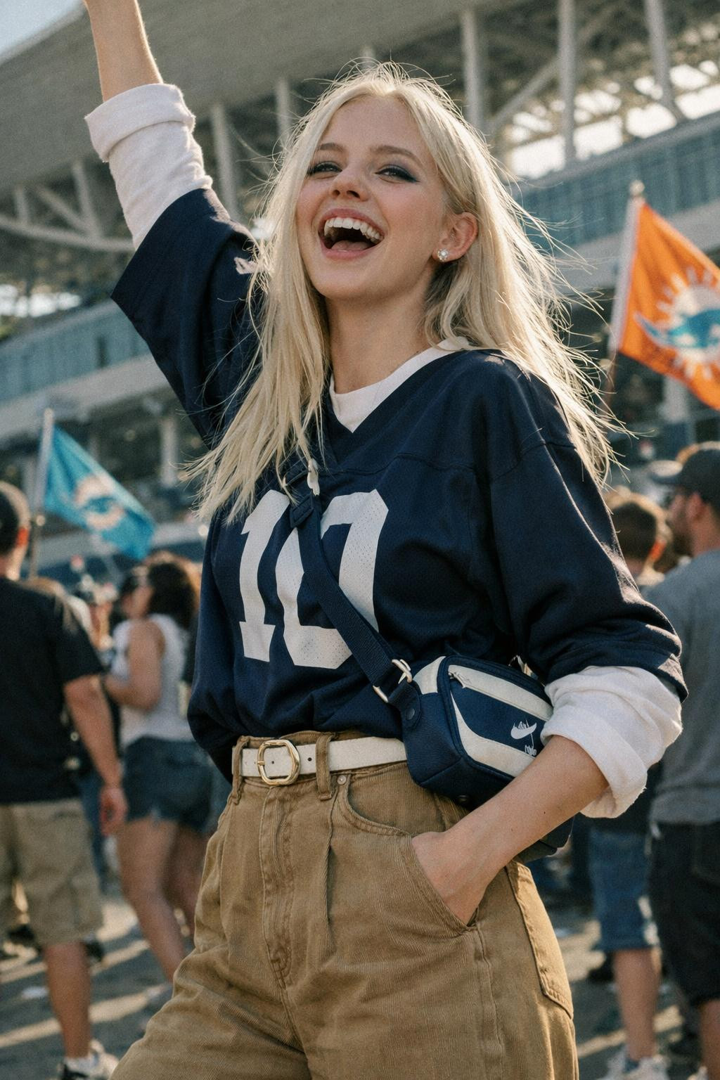Football game outfit with navy jersey layered over white long-sleeve tee