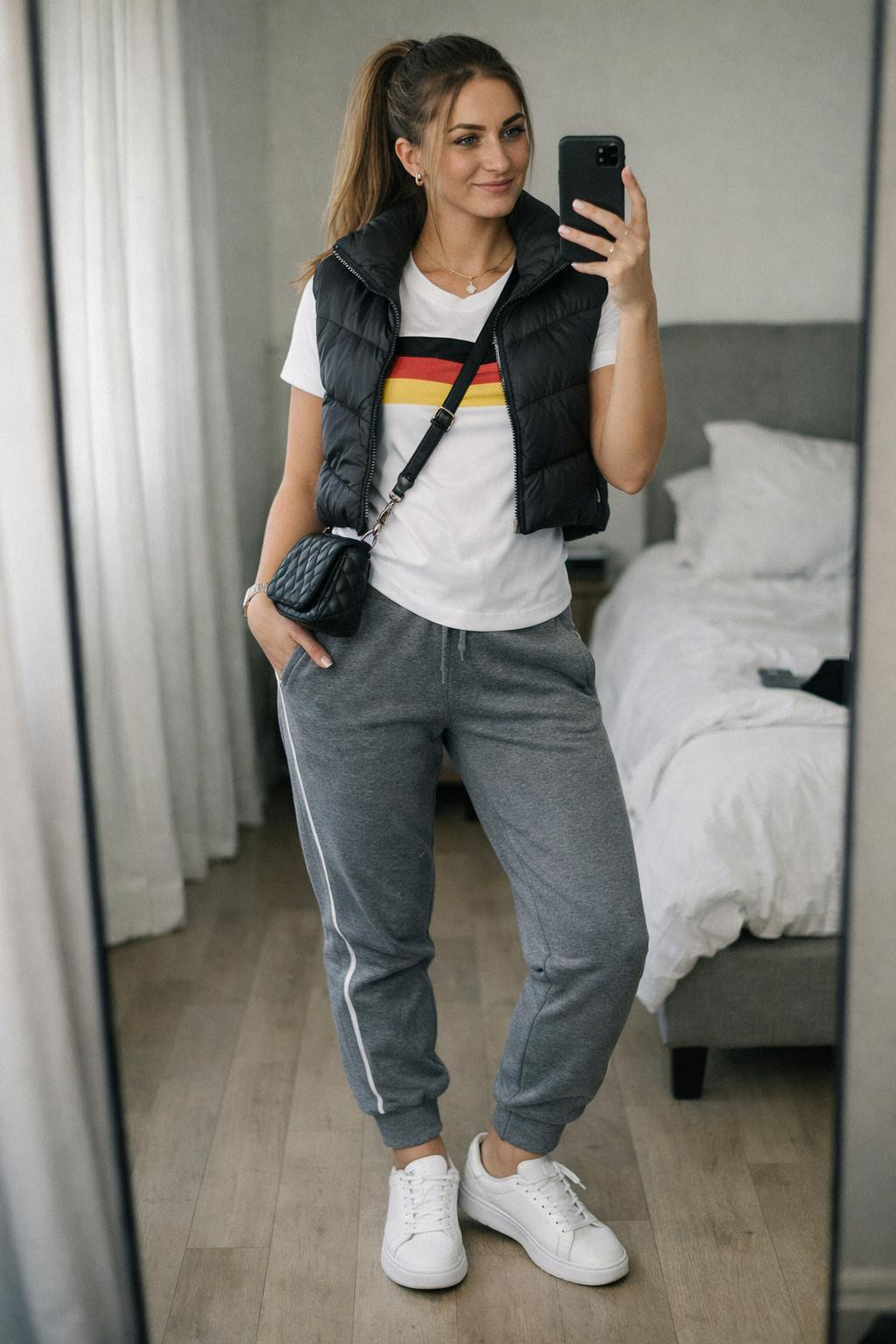 Football game outfit with fitted white jersey and premium grey joggers