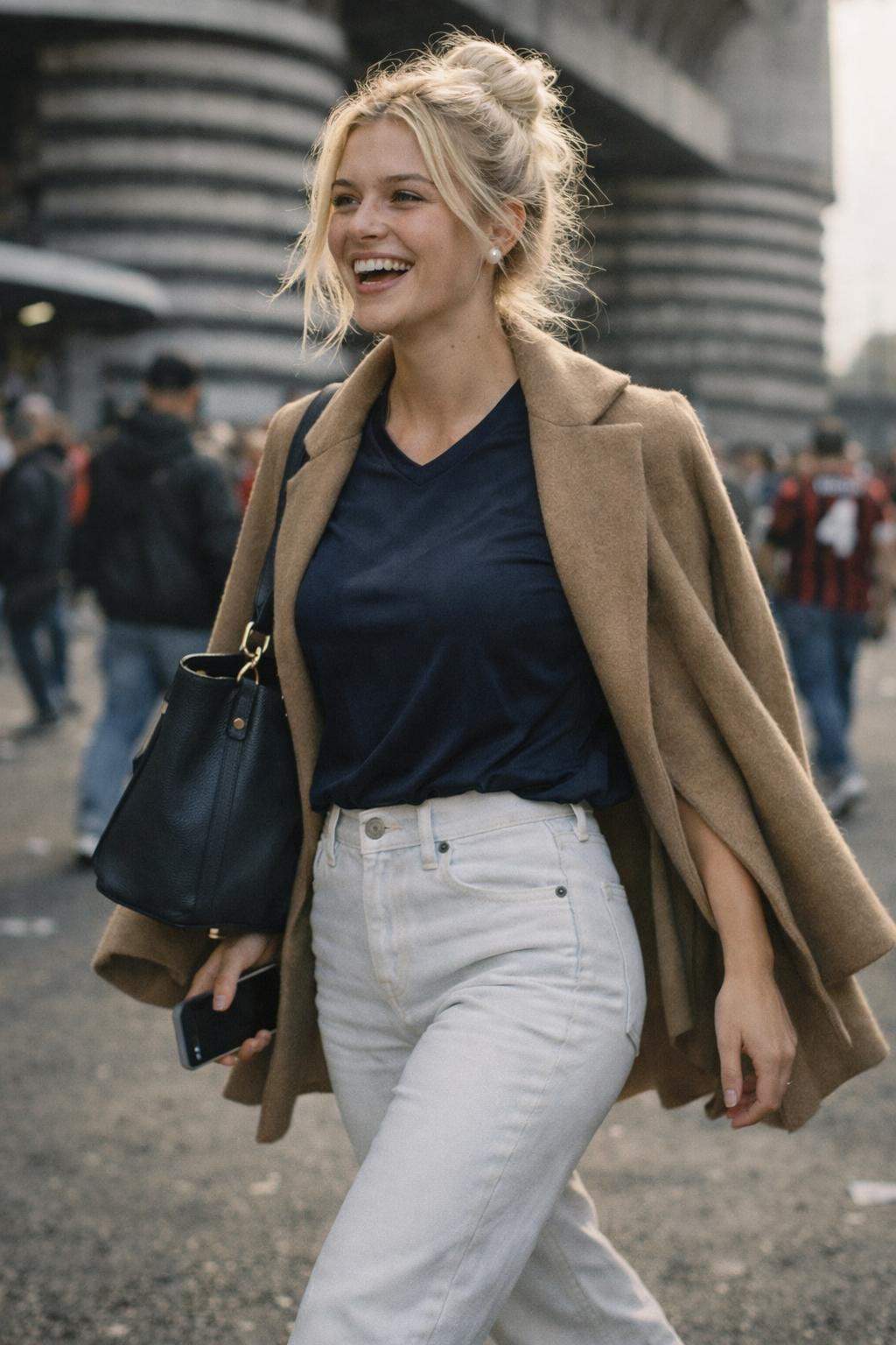 Football game outfit with navy jersey and luxe camel cashmere coat
