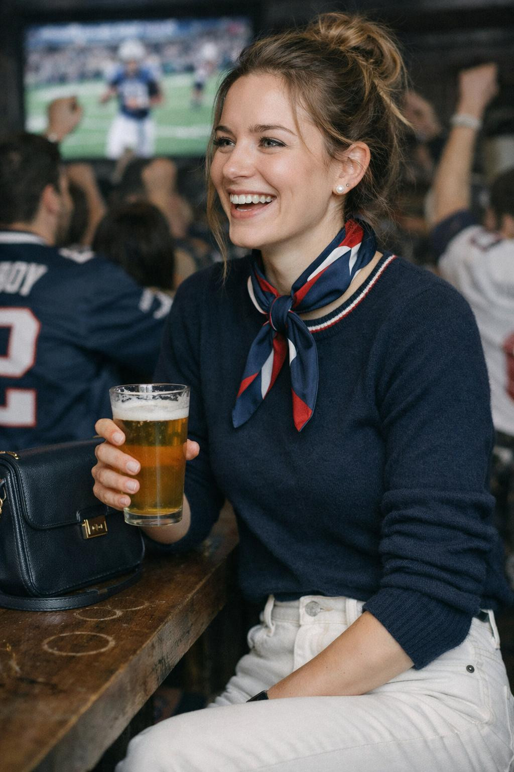 Super Bowl party look navy cashmere sweater with team scarf