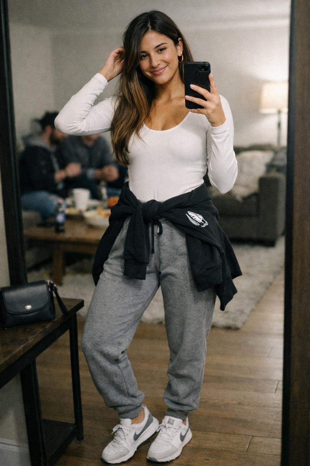 Super Bowl party look with white ribbed bodysuit and grey joggers