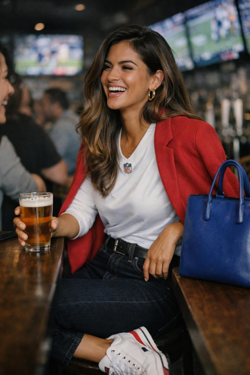 Super Bowl party look with white jersey and red blazer
