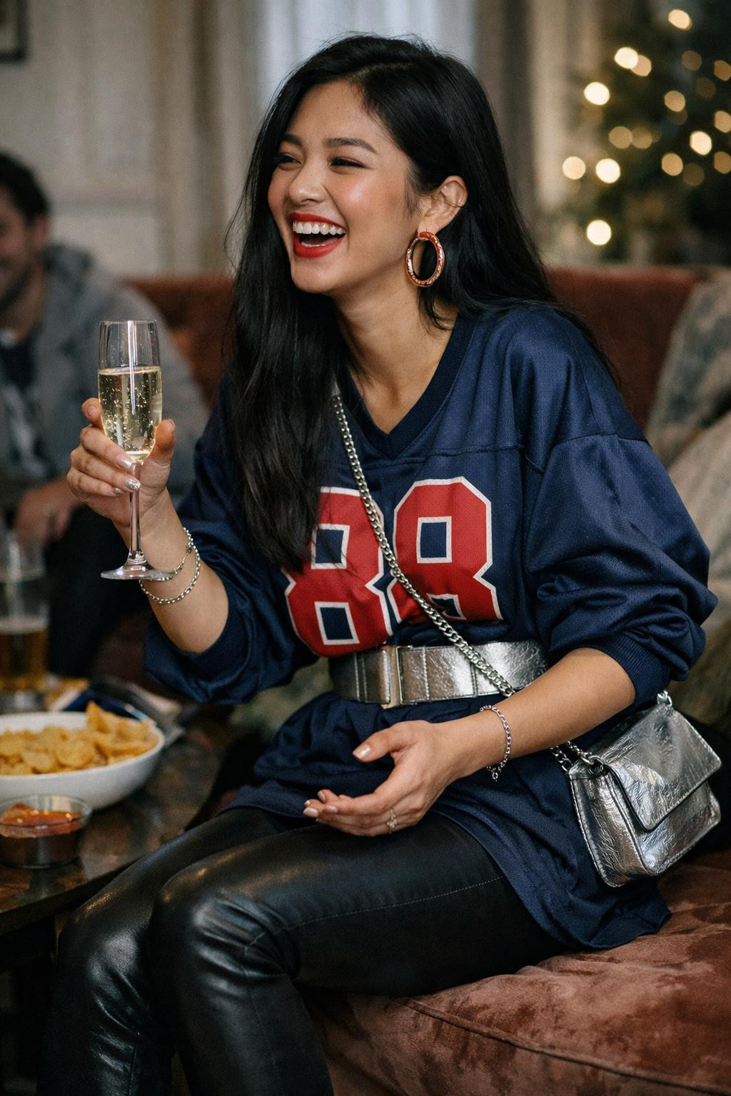 Super Bowl party look with navy jersey mini dress and silver belt