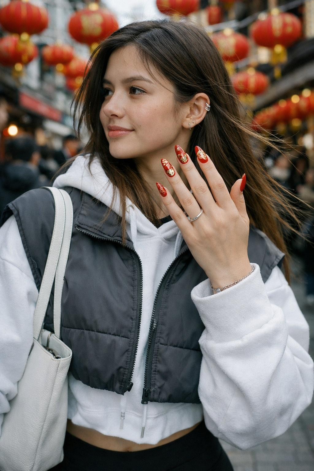 Chinese New Year nails with bold red and lucky gold symbols