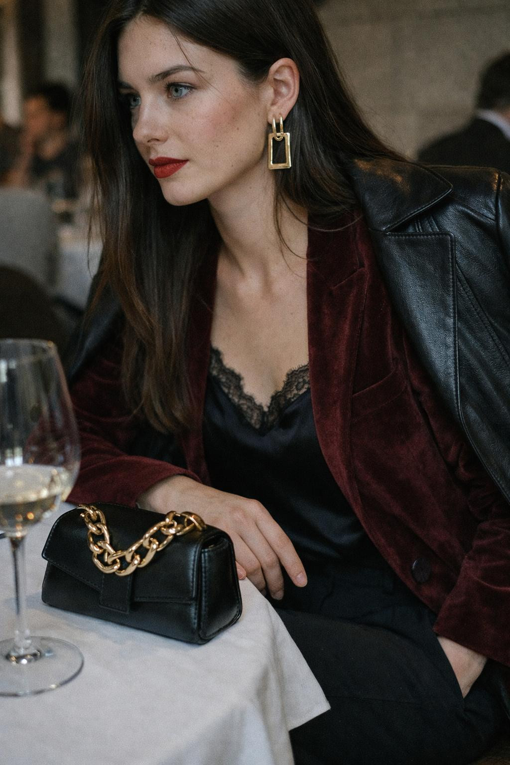 Winter date night outfit with burgundy velvet blazer and black silk camisole