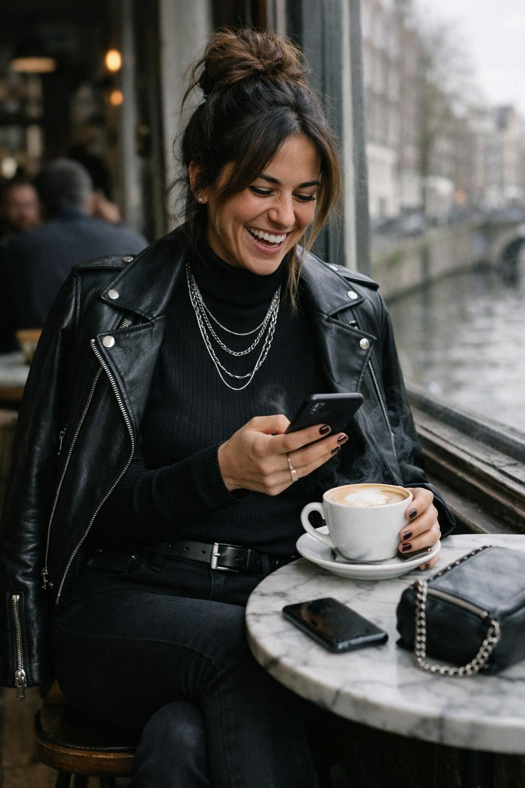 Casual coffee outfit with black ribbed turtleneck and leather jacket