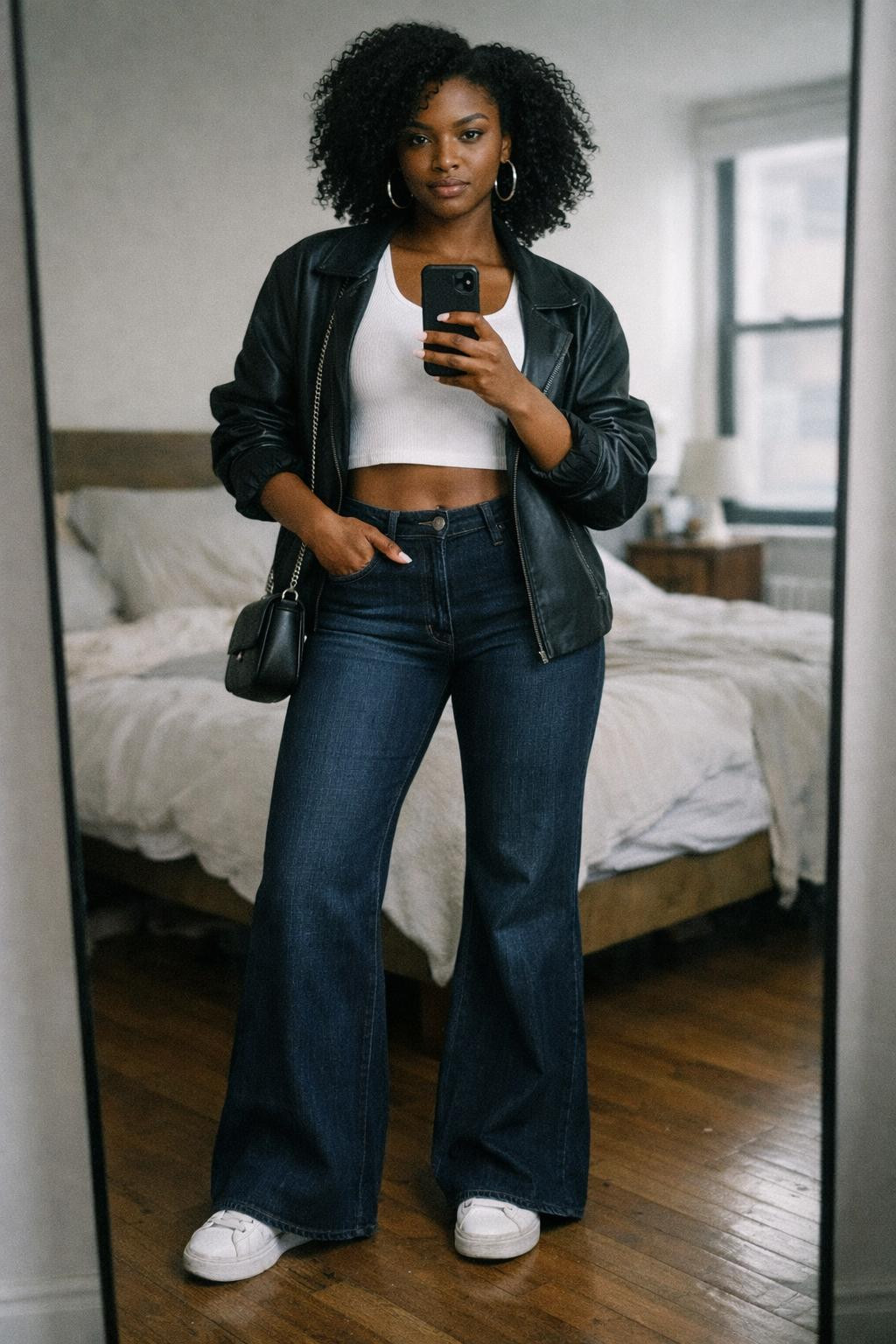 Flare jeans outfit with dark indigo dramatic wide leg and crop top
