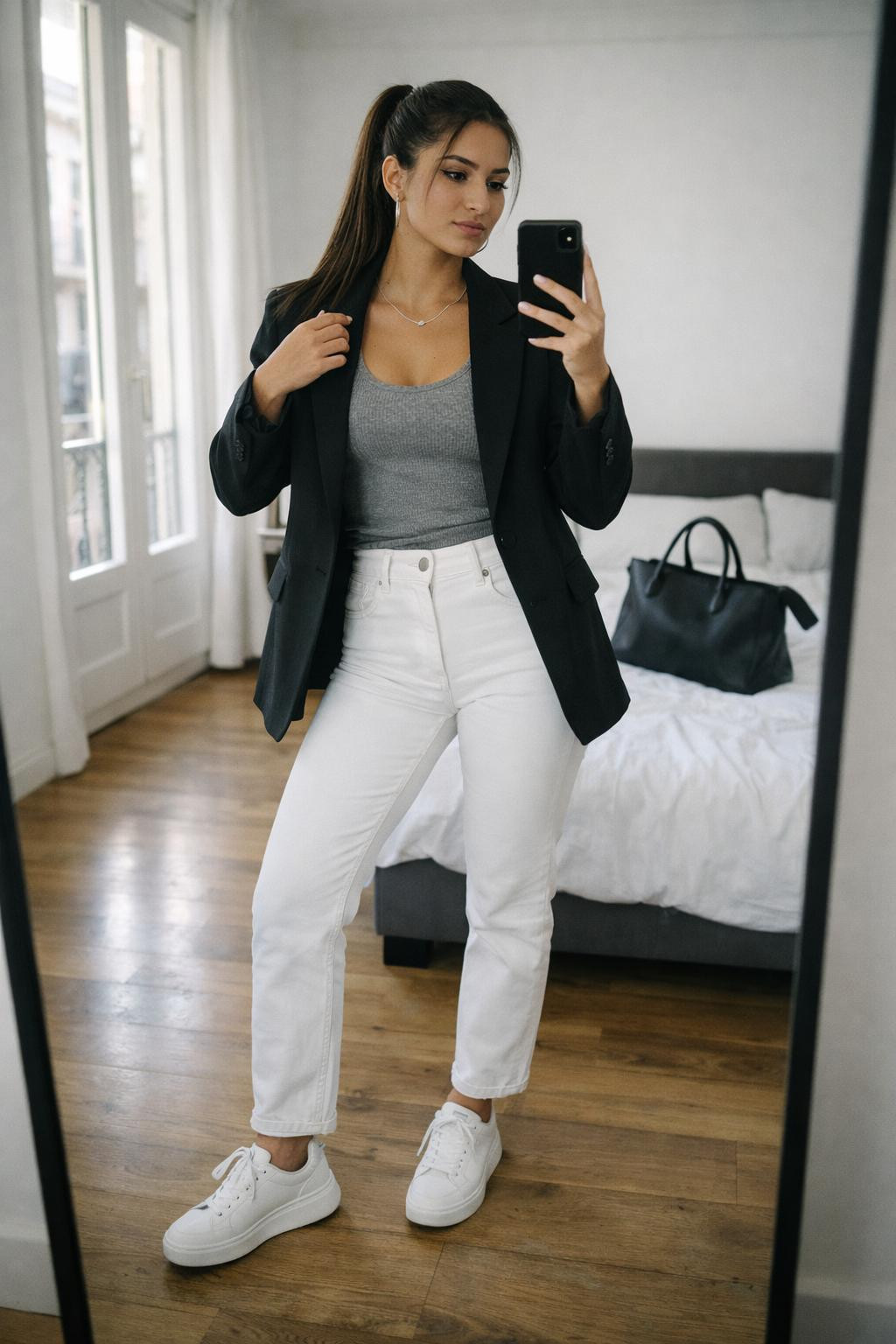 White jeans outfit with grey ribbed tank and tailored black blazer