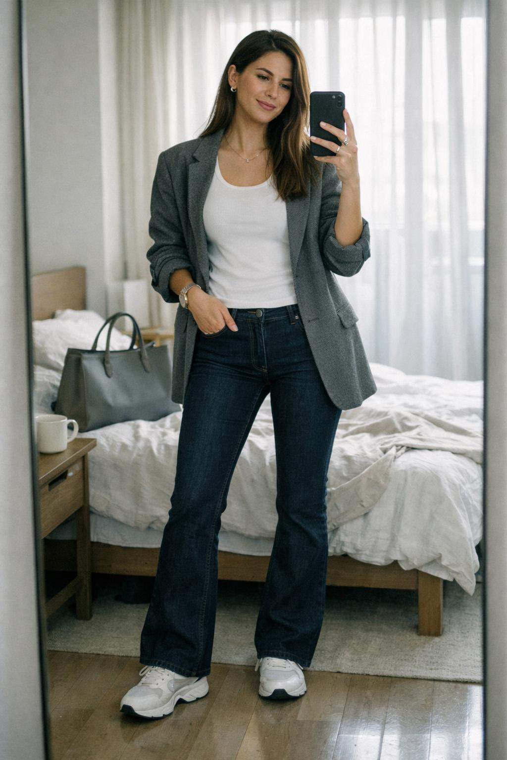 Bootcut jeans outfit with white tank and grey athletic blazer