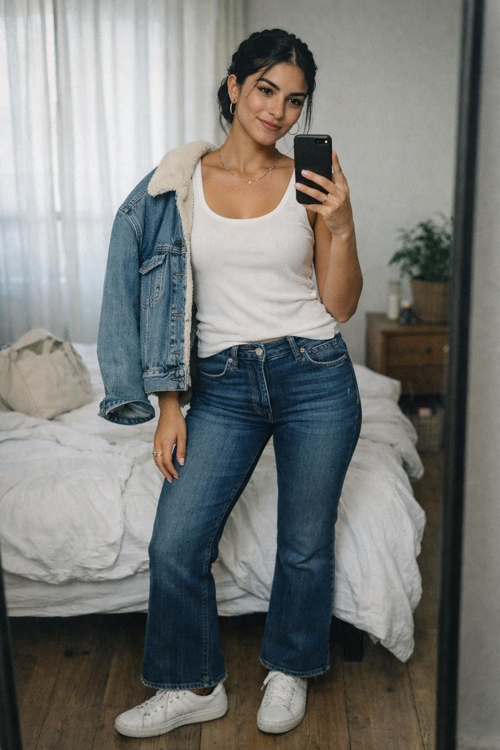 Bootcut jeans outfit minimalist style with white tank and denim jacket