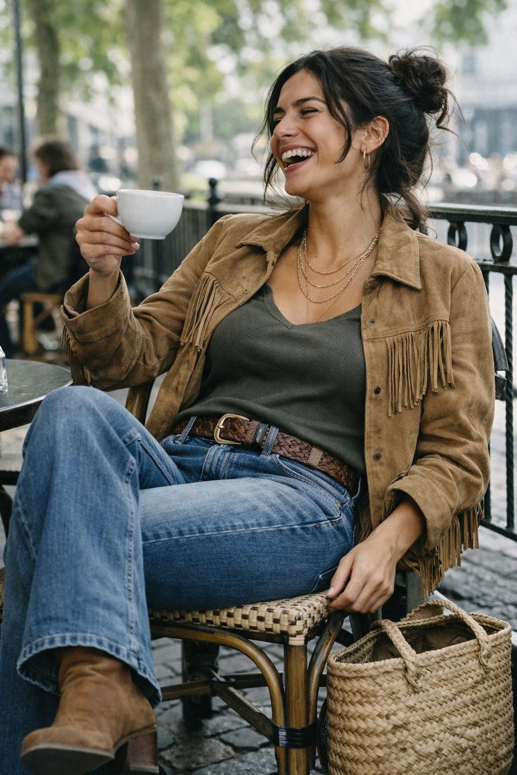 Bootcut jeans outfit with boho layers at Copenhagen café